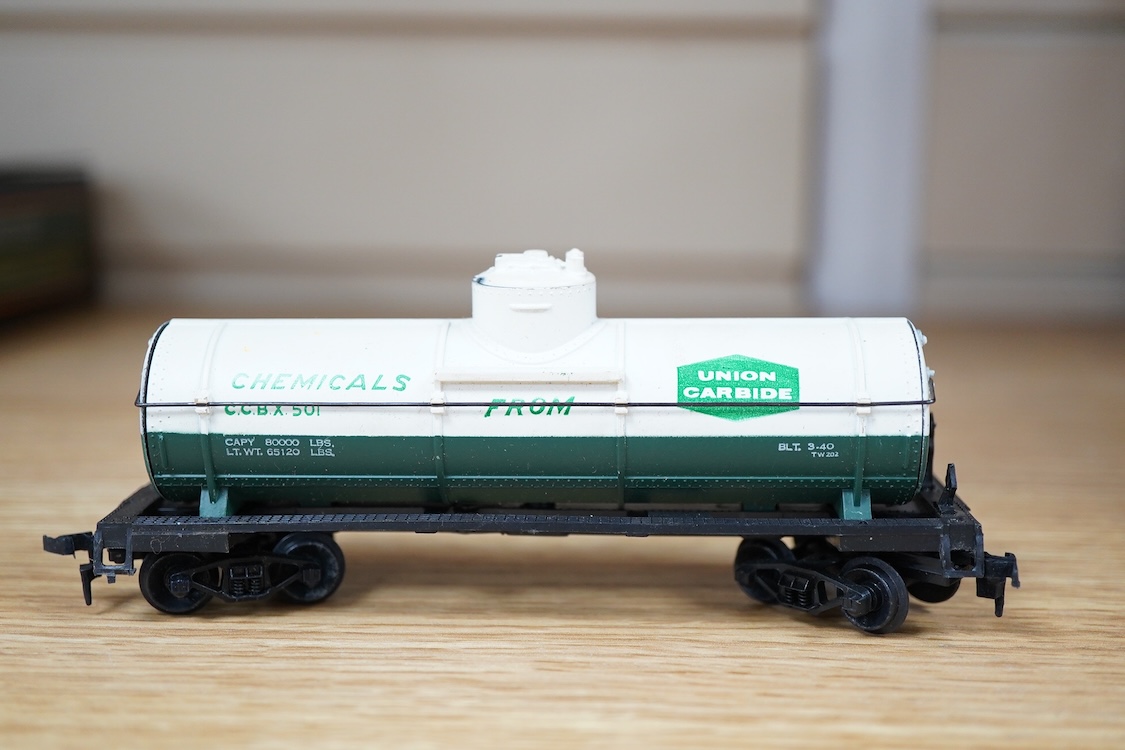 A quantity of US outline HO railway by Athearn, Bachmann, etc. including three locomotives; a Union Pacific Bo-Bo diesel, 1468, a Santa Fe Bo-Bo diesel, 5707, and a Santa Fe 0-4-0 tender engine, together with a 12-wheel